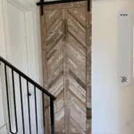 Single sliding barn door for a small bathroom