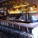Custom wood bar with handmade chairs