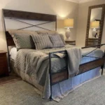 Modern bed and headboard made of reclaimed wood and metal