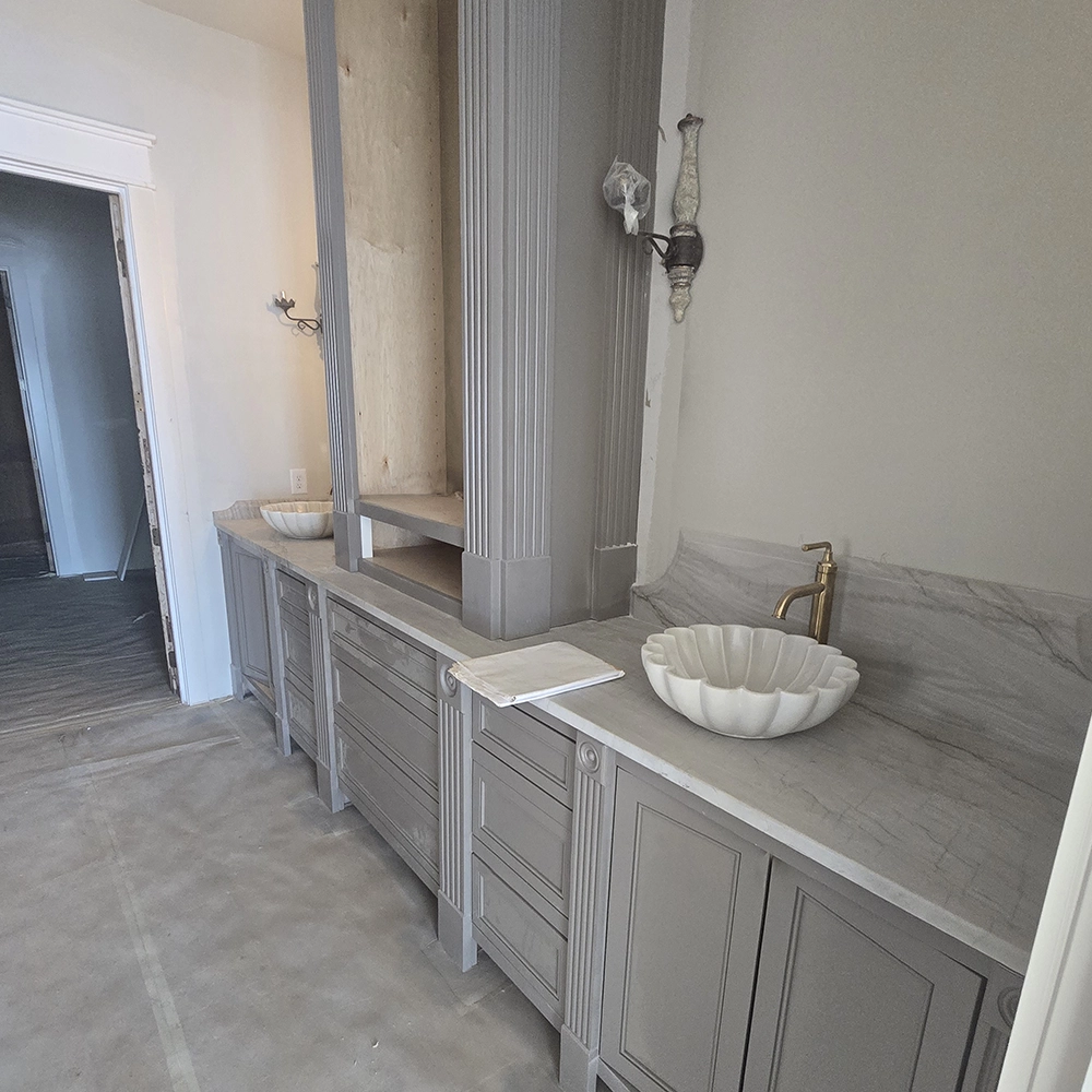 high-end bathroom vanity with white bowl sink