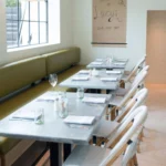 metal top dining tables in a restaurant