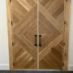 Custom interior wood door with black hardware