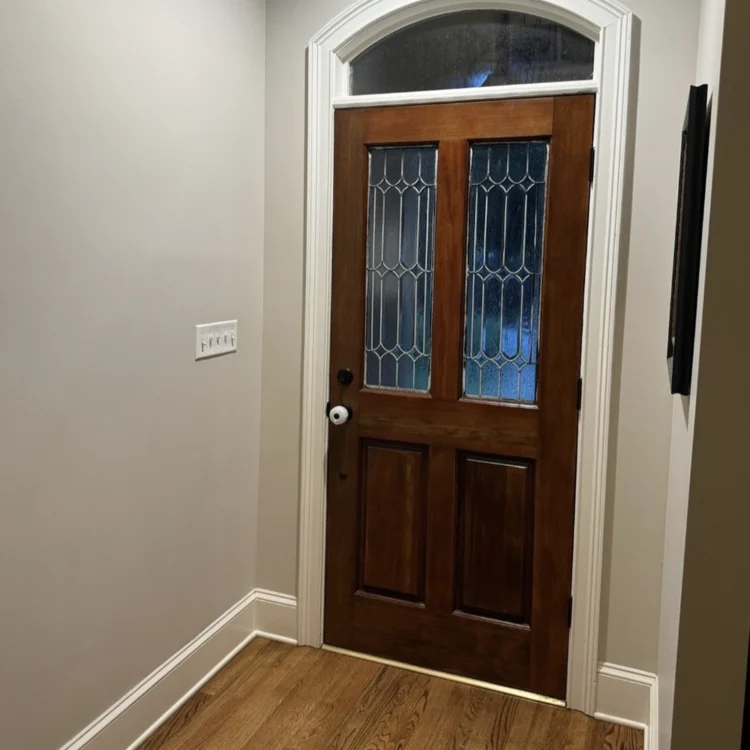 Solid wood interior door with glass panes