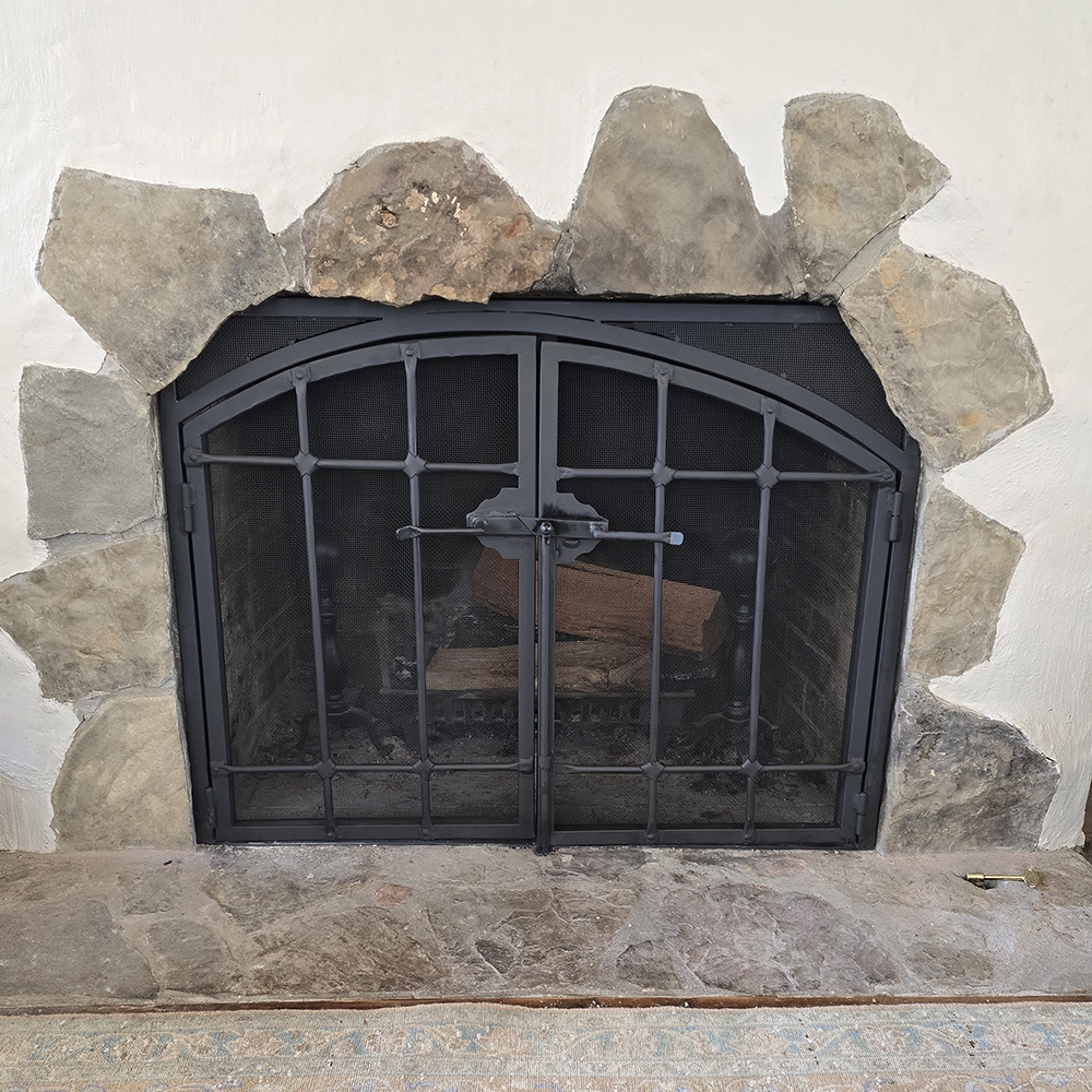 fire screen on a fireplace