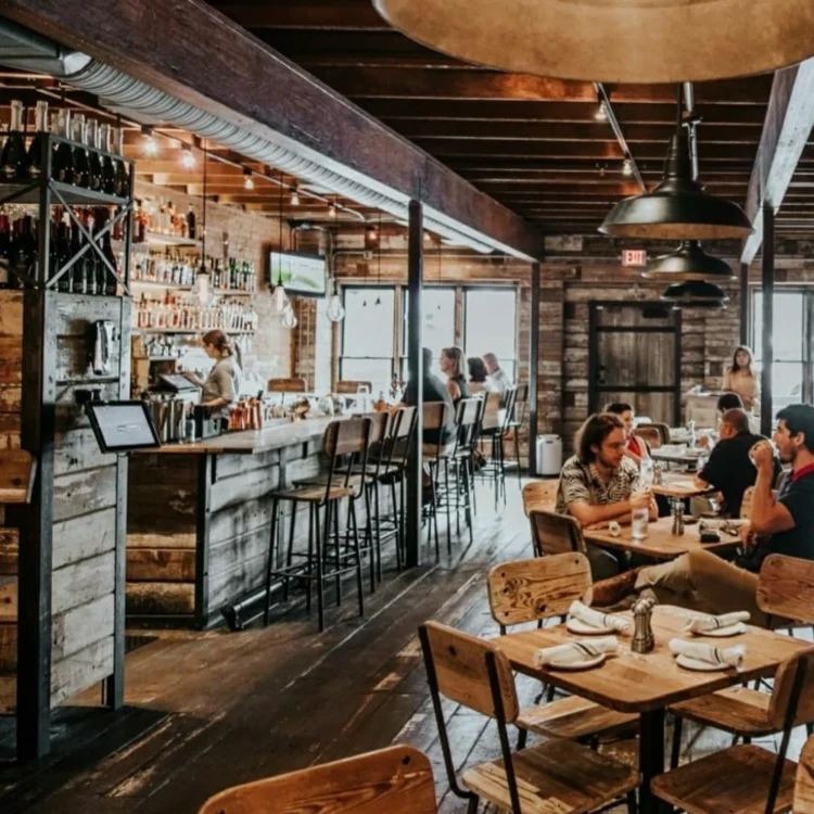 dining chairs at counter, table, and bar in a high-end restaurant