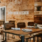 wooden dining seating chairs and table with metal bases