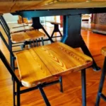 wooden chair with metal frame in dining room