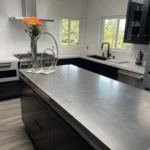 modern kitchen with metal top island