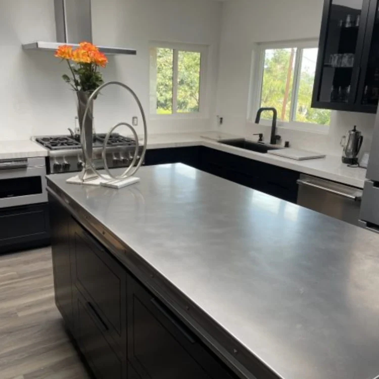 modern kitchen with metal top island