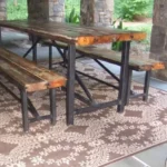 Heavy metal base table with benches for outdoor seating