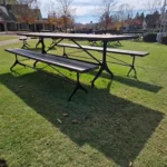 outdoor wood and metal table with benches