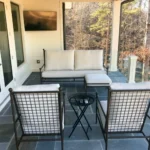Custom metal frame chairs and sofa made for outdoor seating on porch