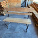 Wood and metal outdoor seating bench for a home