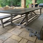 stained wooden patio outdoor table with benches