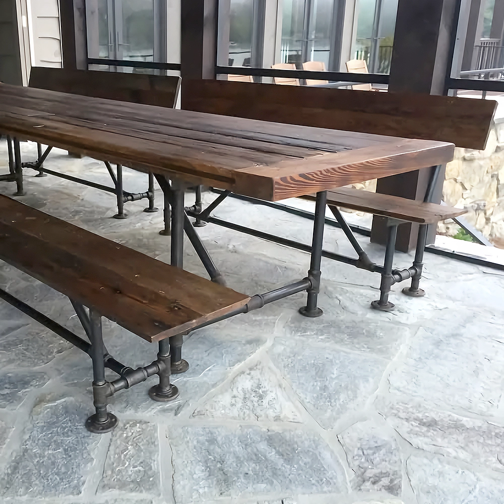 Custom table with benches made of wood and metal