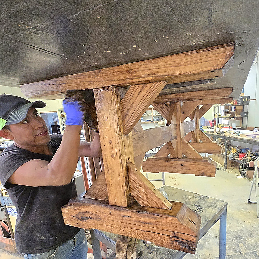 Harvest Custom craftsman assembling a table