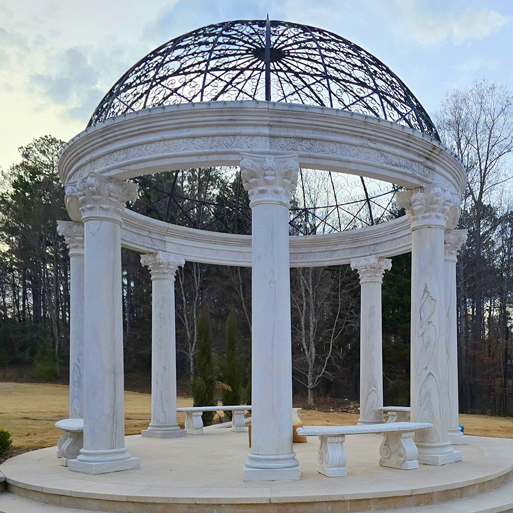 Custom one-of-a-kind metal pergola with marble columns